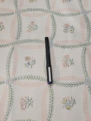 American legacy fabric beige polished cotton w/vines and small flowers 1981