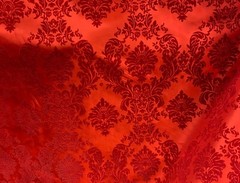 Red taffeta flocking damask on red fabric 60” wide