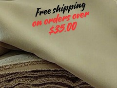 Khaki Tropical 100% Polyester non-stretch, machine washable.