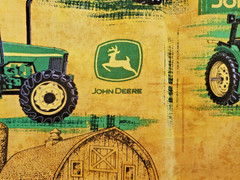 John Deere Cotton Fabric Distressed Yellow Background W/ Tractors and Barns 1 yd