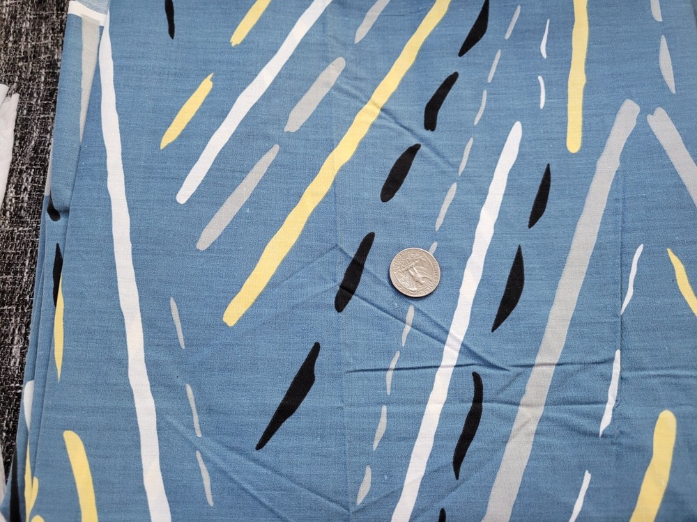 COTTON FABRIC – WHITE, YELLOW, GRAY & BLACK PAINT MARKS ON SLATE BLUE- BTY