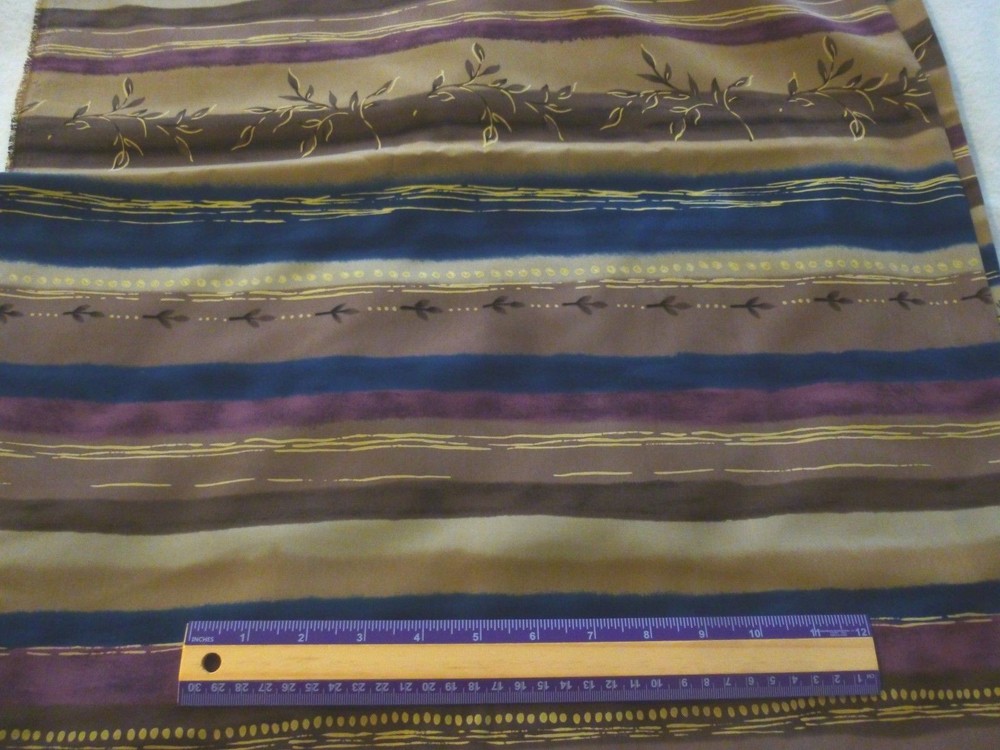 Polyester fabric-sideways floral stripe-browns, purple,navy-2 yds 12″x 45″