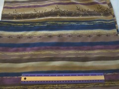 Polyester fabric-sideways floral stripe-browns, purple,navy-2 yds 12″x 45″