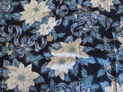 5055. VIP Cranston POINSETTIAS & BOWS on NAVY COTTON FABRIC – 43-1/2″ x 2 yds.