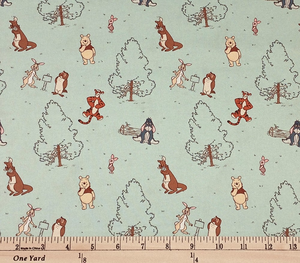 Cotton Winnie the Pooh Group Pack Characters Blue Fabric Print by Yard D601.32