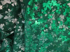 Green and Silver Sharmrock Print on Green Mesh Fabric 60 W x 2 yd AS IS Damaged