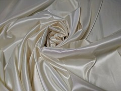 Ivory Taffeta 100% Polyester 59/60″ wide by the yard or roll. Free swatches.