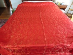 4414. Woven GOLDEN HOLLY on RED Silky Synthetic FABRIC – 65″ x 2-3/8 yds.