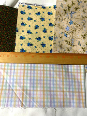 1 pound envelope of cotton fabric remnant pieces /variois colors and prints