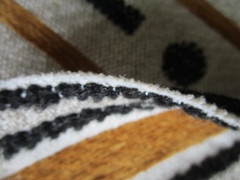 Schumacher’s Serapo Carbon Ochre Black Gold Ivory lines circles modern fabric 1y