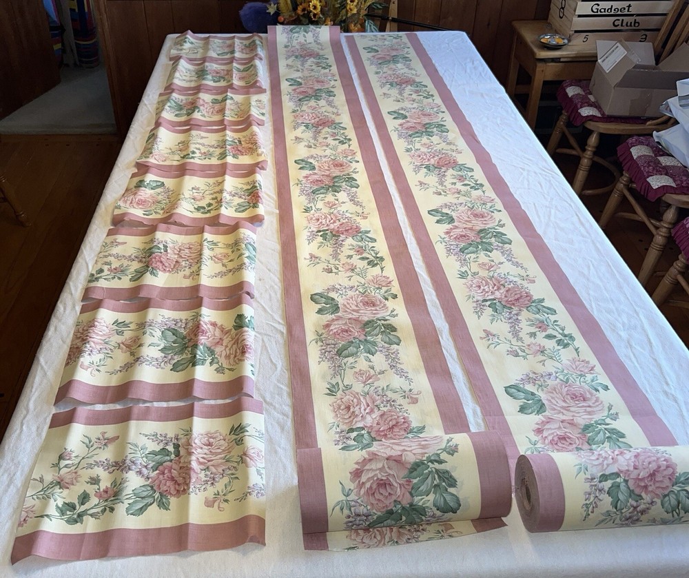 2 rolls ~150 total yds mauve cotton(?) 11″W floral border print fabric, +8 pcs