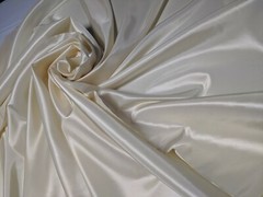 Ivory Taffeta 100% Polyester 59/60″ wide by the yard or roll. Free swatches.
