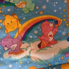 Care Bears Cartoon Print Fabric Blue Rainbow Clouds 44″ W x 89″ L NWOT Vintage