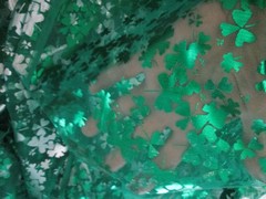 Green and Silver Sharmrock Print on Green Mesh Fabric 60 W x 2 yd AS IS Damaged