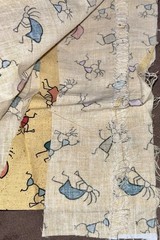 VTG Novelty Folk Art Kokopelli Figures Tossed on Beige Remnant 19″x14″ +