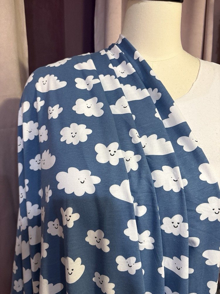 100% Cotton Jersey Knit. POP Brand Sold At JOAnns. 54” Wide. Smiling Clouds