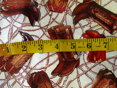 3 YDS COWBOY BOOTS & ROPE ON CREAM 100% COTTON OOP