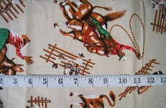 Vintage Rodeo Cowboys on Tan Cotton Quilting Fabric Piece 53″ X 36″