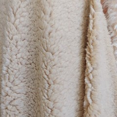 ad Sherpa fabric 100% Poly “58” inches wide sold by the yard