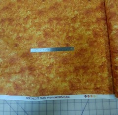 Northcott Studios Textures Sponge Marble Orange Cotton Fabric
