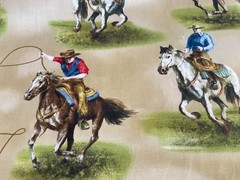 Wilmington prints Riders on the Range western, cowboys, roping tan BTY