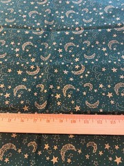 Gold metallic stars and moons on dark green cotton fabric 1 yard 18″ x 44″