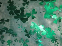 Green and Silver Sharmrock Print on Green Mesh Fabric 60 W x 2 yd AS IS Damaged