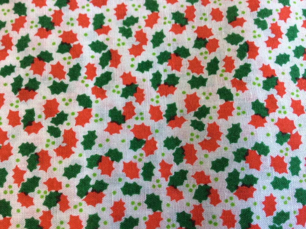 RED & GREEN HOLLY LEAVES ON WHITE COTTON- 1 YARD