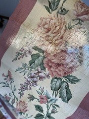 2 rolls ~150 total yds mauve cotton(?) 11″W floral border print fabric, +8 pcs