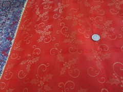 4414. Woven GOLDEN HOLLY on RED Silky Synthetic FABRIC – 65″ x 2-3/8 yds.