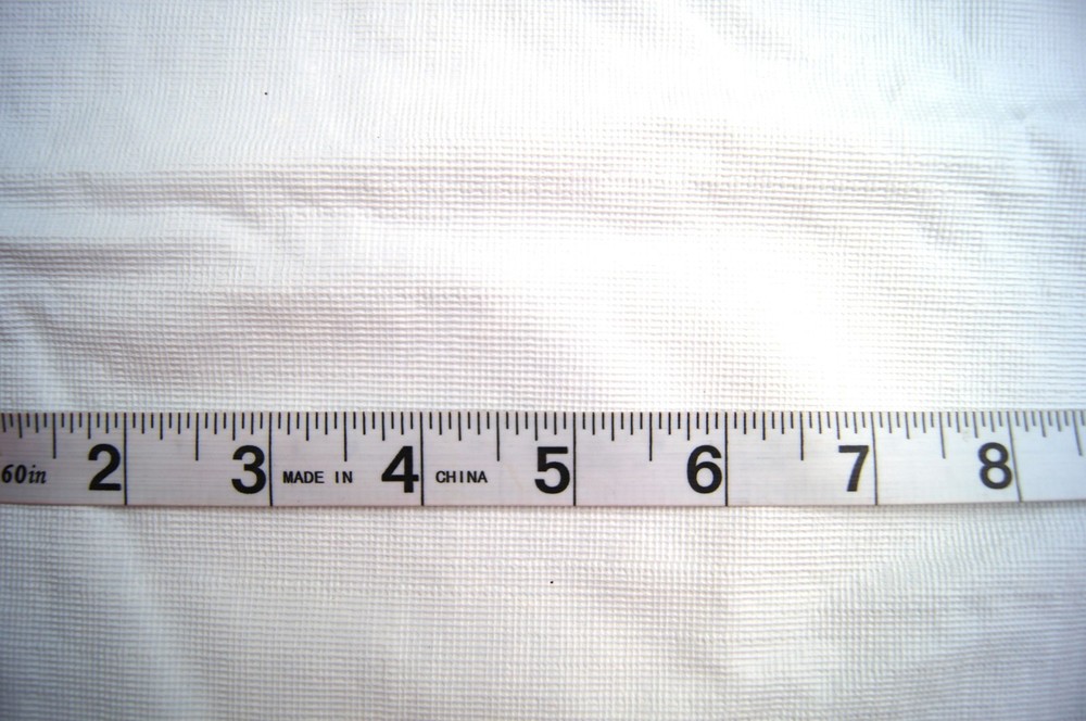 1 Yard Textured White Plastic with Flannel Back Tablecloth Fabric 35″ X 54″