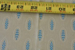 By 1/2 Yd, Blue Leaves on Tan Super-Combed-Cotton, Connecting Threads, V952
