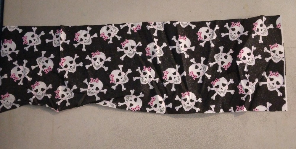 Pink bows on skulls fabric 275795