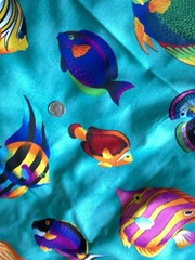 Turquoise Larger Fish Print Cotton Fabric 45” wide. Suitable for quilting.