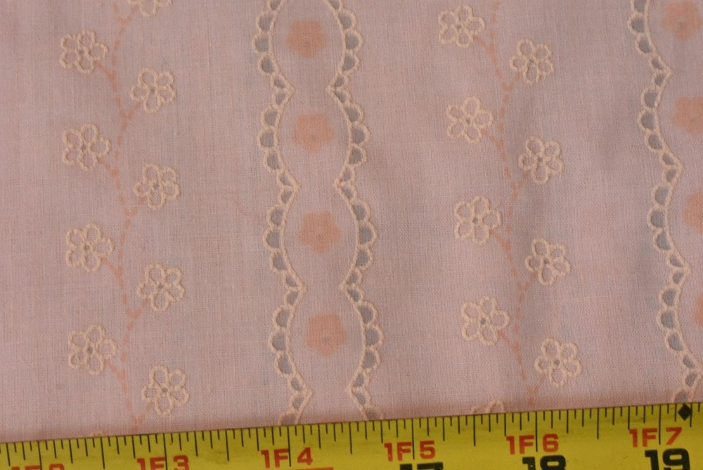 By 1/2 Yd, 37″ Wide, Light-Weight Faux-Eyelet on Pastel-Peach Poly-Cotton, V912