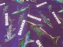 3/4 YD X 60″ COLORFUL SHARK’S ON NAVY BACKGROUND, by MARCUS BROS. # 4726