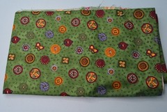1.33 yards Debbie Mumm sewing buttons on green cotton 44″ wide