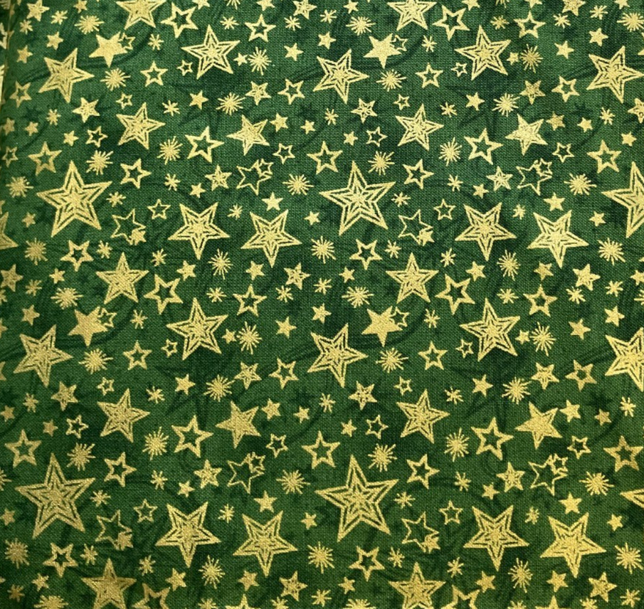 FABRI-QUILT -SEASON’S GREETINGS #103-220-METALLIC GOLD STARS ON GREEN- BY THE YD