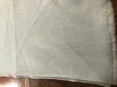 54″L x 62″W light aqua/mint green knit fabric remnant, medium weight & stretch