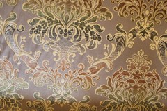 Damask medallion scroll upholstery material in taupe/brown/gold multi on taupe