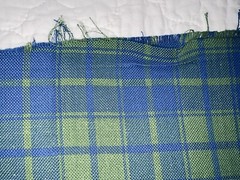 Blue/green plaid in medium weight looser weave synthetic fiber, 38″Lx54″W