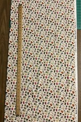 THREAD SPOOLS NEEDLES BOBBINS ON CREAM COTTON FABRIC BTHY