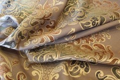 Damask medallion scroll upholstery material in taupe/brown/gold multi on taupe