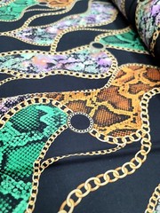 Snake print, Animal print, Jersey Knit Fabric. GREEN ORANGE STRETCH FABRIC Black