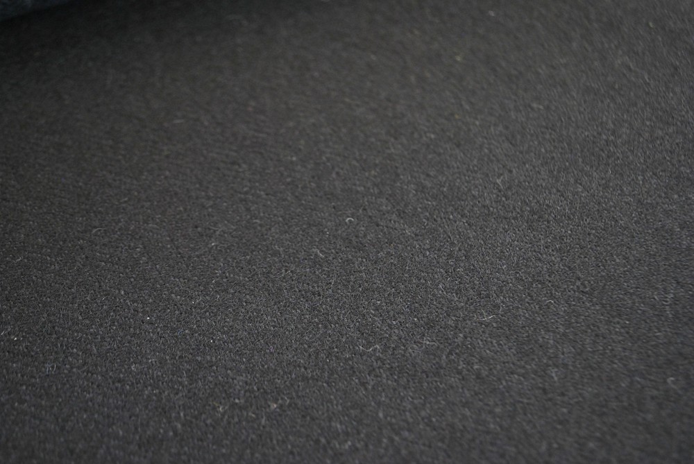 Tweed material by the metre or yard in plain black with Herringbone pattern