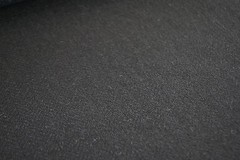 Tweed material by the metre or yard in plain black with Herringbone pattern
