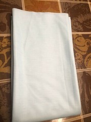 54″L x 62″W light aqua/mint green knit fabric remnant, medium weight & stretch