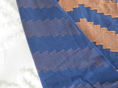 4411 ORANGE Machine Embroidered ZIGZAG DESIGN on NAVY COTTON FABRIC-48″x 4 yds.