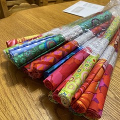 25 Kaffe Fassett Collective Fat Quarters In Cigar Rolls.