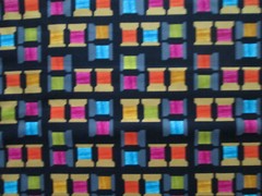 THREAD SPOOLS OF THREAD BRIGHT COLORS BLACK COTTON FABRIC FQ